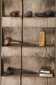 Carved wood shelf with artifacts, Wangdue Phodrang, Western Bhutan