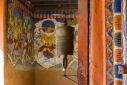 Spinning prayer wheel at the entrance to Gangtey Monastery, Phobjikha Valley, Western Bhutan