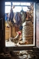 Rooster and hen at entrance to milking shed in a farming community in the Haa Valley in Western Bhutan
