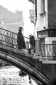 Venetians on a bridge