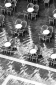 Tables and chairs over reflections in St. Mark's Square, Venice, seen from the Campanile