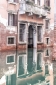 Classic Venetian palazzo reflected in a still canal
