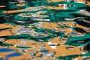 Abstract reflections, green and gold swirls, Venice