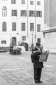 Reading the newspaper in a square in Venice