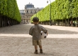 Young aspiring footballer, Palais Royal gardens, Paris