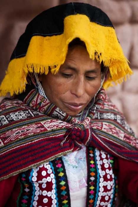 Inca woman spinning wool at Awana Kancha near Cusco, Peru