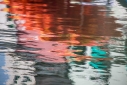 Red and green abstract reflections in Venice