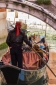 Gondola with tourists on one of the smaller canals in the Castello Sestiere of Venice