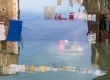 Clotheslines reflected in canal in Venice