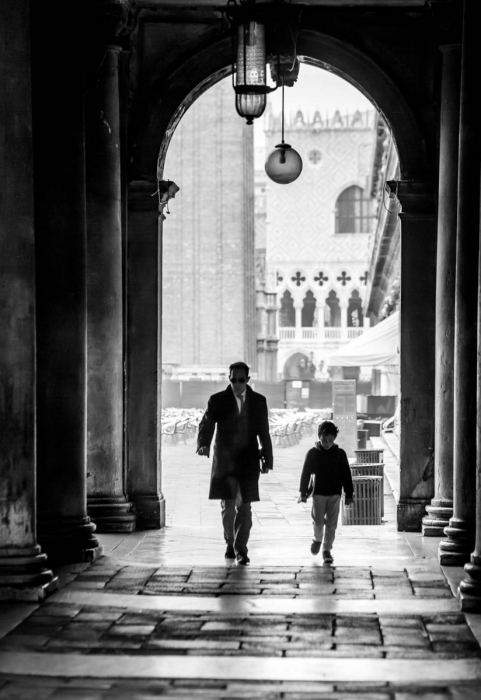 Father and son on the way to work and school, St. Mark's Square, Venice